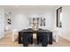 Elegant dining area with a modern table and mirrors at 6921 N Joshua Tree Ct, Paradise Valley, AZ 85253