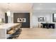 Open concept kitchen and dining area with hardwood floors and modern fixtures at 6921 N Joshua Tree Ct, Paradise Valley, AZ 85253