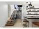 Elegant staircase leading to the lower level at 6921 N Joshua Tree Ct, Paradise Valley, AZ 85253