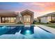 Inviting pool reflecting the beautiful sunset at 6921 N Joshua Tree Ct, Paradise Valley, AZ 85253