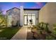 Modern entryway with glass doors and brick pathway at 6921 N Joshua Tree Ct, Paradise Valley, AZ 85253
