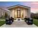 Outdoor patio with fire pit and comfortable seating at 6921 N Joshua Tree Ct, Paradise Valley, AZ 85253