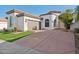 Front view of house with garage and landscaping at 8133 E Cortez Dr, Scottsdale, AZ 85260