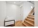 Modern staircase with light wood and white walls at 8133 E Cortez Dr, Scottsdale, AZ 85260