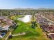 Aerial view of golf course and lakefront community at 8133 E Cortez Dr, Scottsdale, AZ 85260