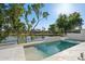 Luxury pool and spa overlooking a lake at 8133 E Cortez Dr, Scottsdale, AZ 85260