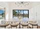 Elegant dining room with large windows and water views at 8133 E Cortez Dr, Scottsdale, AZ 85260