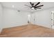 Spacious bedroom featuring hardwood floors and ceiling fan at 8133 E Cortez Dr, Scottsdale, AZ 85260