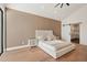 Bright bedroom with a king-size bed, ensuite bathroom, and large window at 8133 E Cortez Dr, Scottsdale, AZ 85260