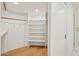 Large walk-in closet with built-in shelving at 8133 E Cortez Dr, Scottsdale, AZ 85260