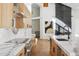 Modern kitchen with marble countertops and a gas fireplace at 8133 E Cortez Dr, Scottsdale, AZ 85260