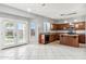 Kitchen with island, stainless steel appliances, and wood cabinets at 24813 W Rosita Ave, Buckeye, AZ 85326