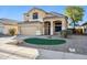 Two-story house with a landscaped yard and a two-car garage at 24813 W Rosita Ave, Buckeye, AZ 85326