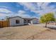 Charming single story home with gravel yard and attached garage at 8581 W Ironwood Dr, Peoria, AZ 85345