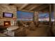 Relaxing patio features a fireplace and city views at 5802 E Cholla Ln, Paradise Valley, AZ 85253