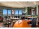 Spacious home office with curved sofa and city views at 5802 E Cholla Ln, Paradise Valley, AZ 85253