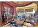 Formal dining room, featuring a large wooden table and ornate chairs at 5802 E Cholla Ln, Paradise Valley, AZ 85253