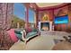 Sitting area with fireplace and mountain views at 5802 E Cholla Ln, Paradise Valley, AZ 85253