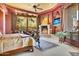 Luxurious main bedroom with fireplace and large windows at 5802 E Cholla Ln, Paradise Valley, AZ 85253