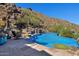 Expansive pool with a mosaic design and flagstone patio at 5802 E Cholla Ln, Paradise Valley, AZ 85253