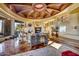 Grand living room with a fireplace, high ceilings, and expansive windows at 5802 E Cholla Ln, Paradise Valley, AZ 85253