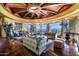 Living room features a circular design, high ceilings, and expansive windows at 5802 E Cholla Ln, Paradise Valley, AZ 85253