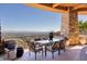 Large patio with city views and seating for six at 5802 E Cholla Ln, Paradise Valley, AZ 85253
