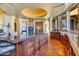 Spacious kitchen with an island, custom cabinetry, and granite counters at 5802 E Cholla Ln, Paradise Valley, AZ 85253