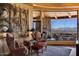Cozy sitting area with two armchairs and a chessboard, plus scenic view at 5802 E Cholla Ln, Paradise Valley, AZ 85253