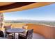 Outdoor patio with seating area and panoramic mountain views at 5802 E Cholla Ln, Paradise Valley, AZ 85253