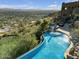 Luxury infinity pool overlooking breathtaking city views at 5802 E Cholla Ln, Paradise Valley, AZ 85253