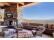 Relaxing patio with seating and expansive mountain views at 5802 E Cholla Ln, Paradise Valley, AZ 85253