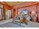 Spacious bedroom with large bed and sitting area at 5802 E Cholla Ln, Paradise Valley, AZ 85253