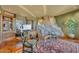 Home office with built-in shelves and stone wall at 5802 E Cholla Ln, Paradise Valley, AZ 85253