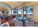 Gourmet kitchen with granite counters, custom cabinetry, and a breakfast nook at 5802 E Cholla Ln, Paradise Valley, AZ 85253