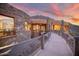 Mountainside home with stone exterior and a curved walkway at 5802 E Cholla Ln, Paradise Valley, AZ 85253