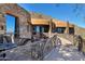 Exterior of home with stone facade and walkway at 5802 E Cholla Ln, Paradise Valley, AZ 85253