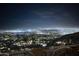 Night time aerial view of city lights below at 5802 E Cholla Ln, Paradise Valley, AZ 85253