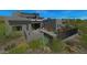 Modern home with a private backyard, featuring a patio and landscaping at 10023 E Filaree Ln, Scottsdale, AZ 85262