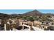 Aerial view of a house under construction in a mountainous area at 10023 E Filaree Ln, Scottsdale, AZ 85262