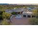 Luxury home with expansive views and a large driveway at 10119 E Horizon Dr, Scottsdale, AZ 85262