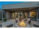 Expansive backyard patio with fire pit and comfortable seating, perfect for outdoor entertaining at 10119 E Horizon Dr, Scottsdale, AZ 85262