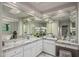 Large bathroom with double vanity, extensive counter space, and modern fixtures at 10119 E Horizon Dr, Scottsdale, AZ 85262
