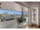 Spacious backyard patio with seating area, fire pit, and stunning views at 10119 E Horizon Dr, Scottsdale, AZ 85262