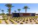Attractive community entrance with water feature and desert landscaping at 1301 W Via De Olivos --, Queen Creek, AZ 85140