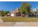 Two-story home with a two-car garage and landscaped front yard at 1234 E Washington Ave, Gilbert, AZ 85234