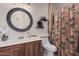 Bathroom with updated vanity and patterned shower curtain at 2717 W Nighthawk Way, Phoenix, AZ 85045