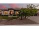 House exterior at dusk, showcasing architectural details and landscaping at 2717 W Nighthawk Way, Phoenix, AZ 85045