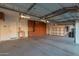Spacious garage with built-in shelving and cabinets at 2717 W Nighthawk Way, Phoenix, AZ 85045