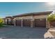 Beautiful home with three-car garage and attractive landscaping at 2717 W Nighthawk Way, Phoenix, AZ 85045